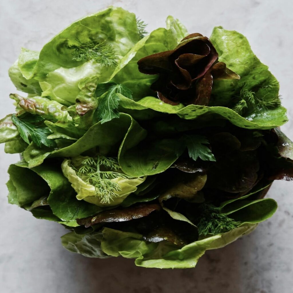 Fresh mixed greens salad, an example of a diet for eye health rich in lutein and zeaxanthin